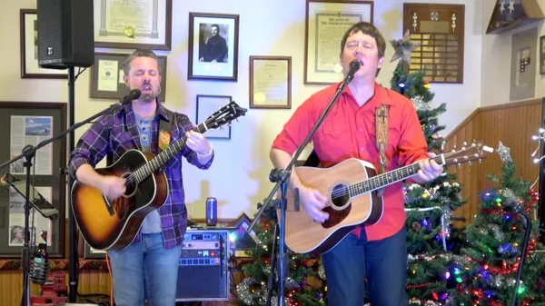 Aaron Traffas Band performing with acoustic guitars at American Legion in Ellinwood, in central Kansas