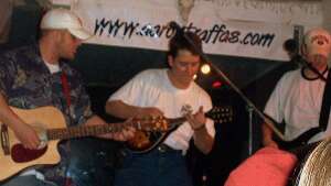 Pearl Grey singing with acoustic guitar at Buster's Saloon in Sun City, in south-central Kansas