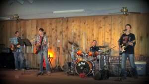 Aaron Traffas Band performing at Nixon Auction Gallery in Medicine Lodge, in south-central Kansas