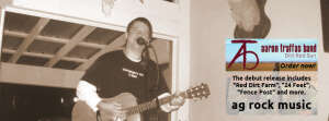 Aaron Traffas singing with acoustic guitar at Buster's Saloon in Sun City, in south-central Kansas