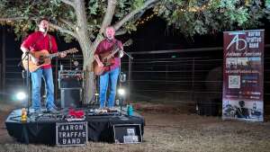 Aaron Traffas Band performing with acoustic guitars at a private party in Medicine Lodge, in south-central Kansas