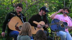 Aaron Traffas, Blaine Younger, and Dusty Feighner performing at Goat House in Manhattan, in northeast Kansas